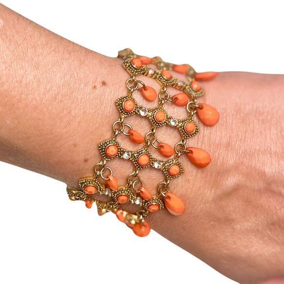 Vintage Jewelry - ❄️Sale❄️
 Orange Gold tone wide Bracelet dangling faceted beads